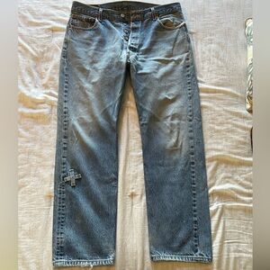 Unique Levi’s 501 jeans.  W38,L34.  Added embellishment to RT leg-see pictures.